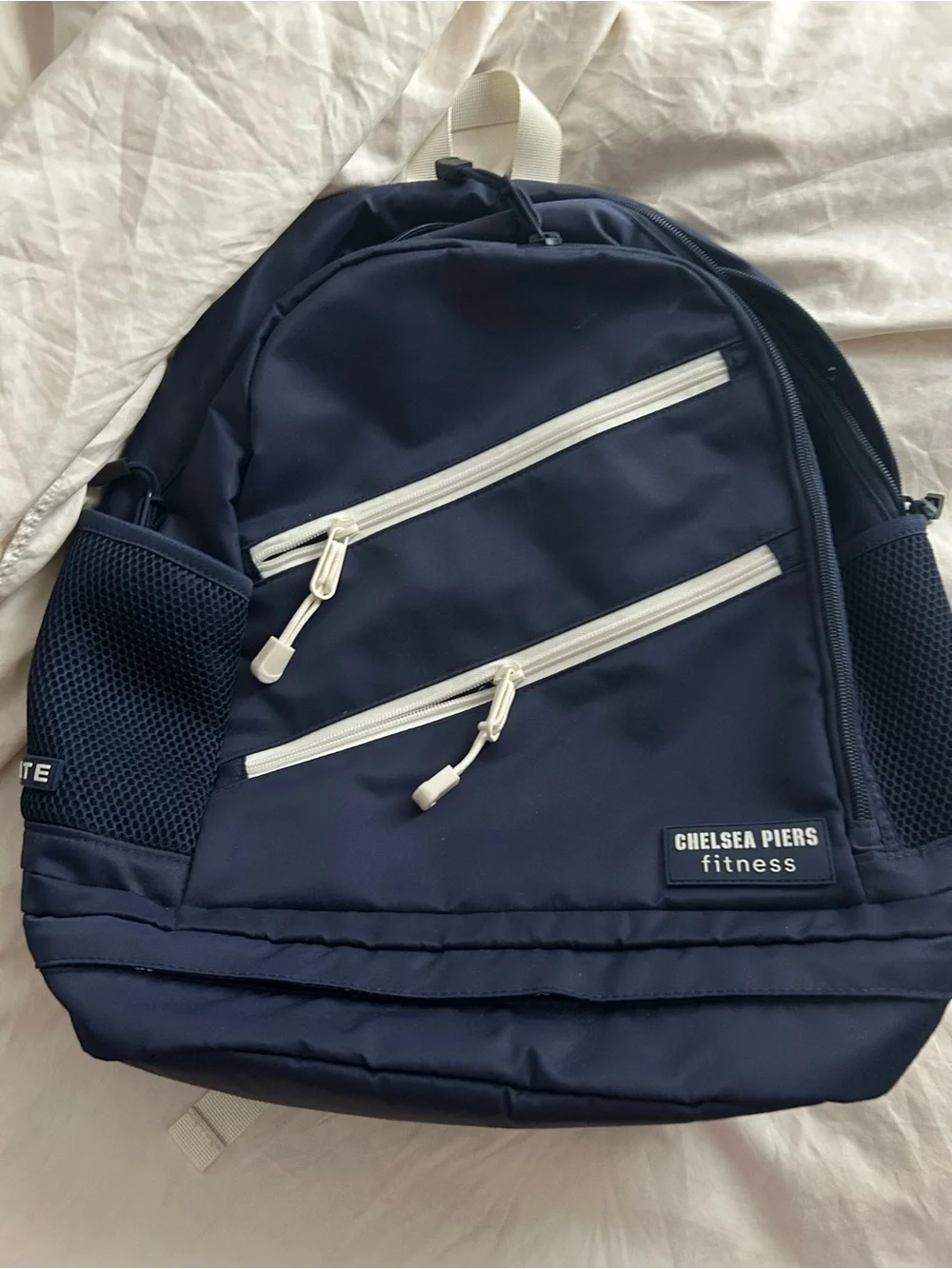 STATE Navy Paddle Backpack with White Zipper Accents